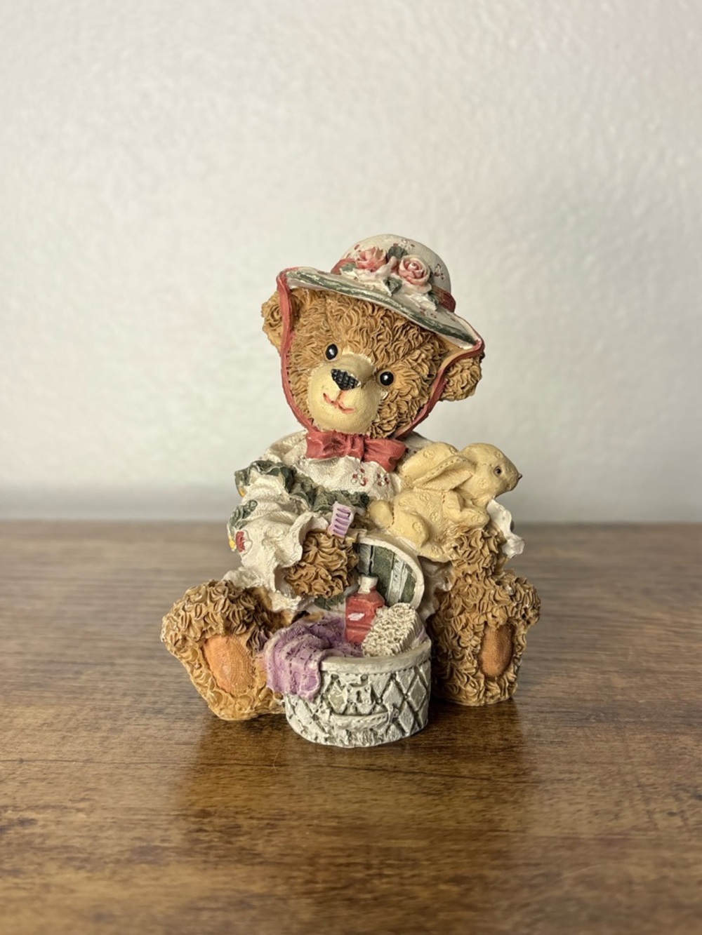 Decorative Brown Bear Figurine with Floral Hat